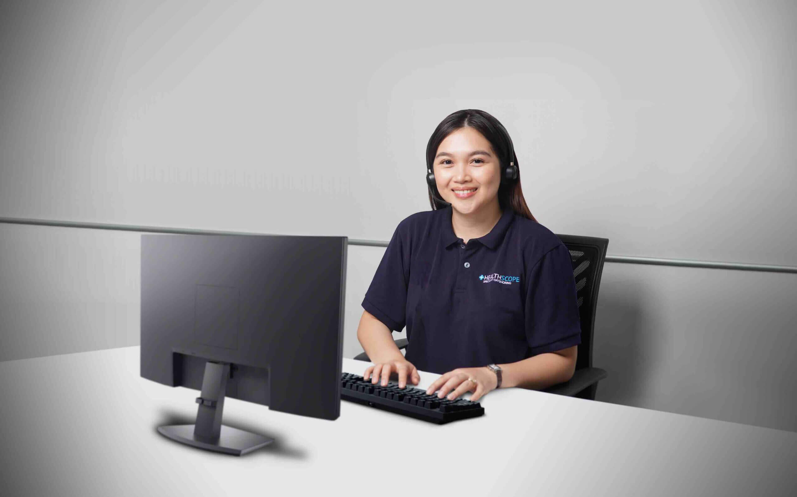 Healthscope team member working at her station in the Philippines